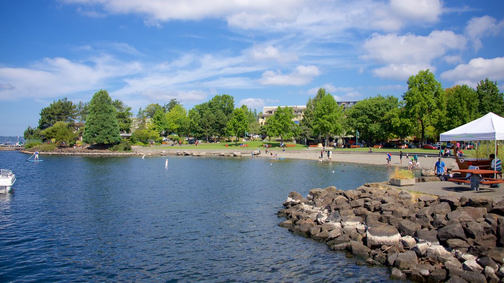 Marina Park which includes a pebble beach and a bay or harbor