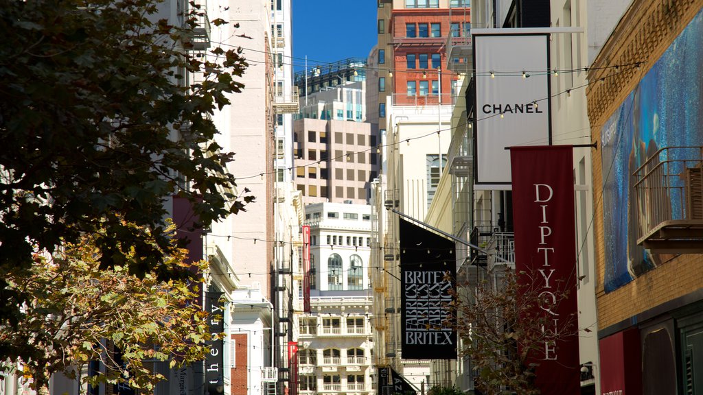 Maiden Lane featuring signage, city views and a city