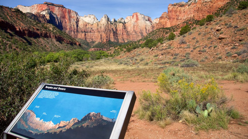 Zion Human History Museum showing mountains, signage and tranquil scenes