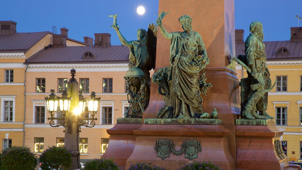 Senate Square which includes a monument, a square or plaza and night scenes