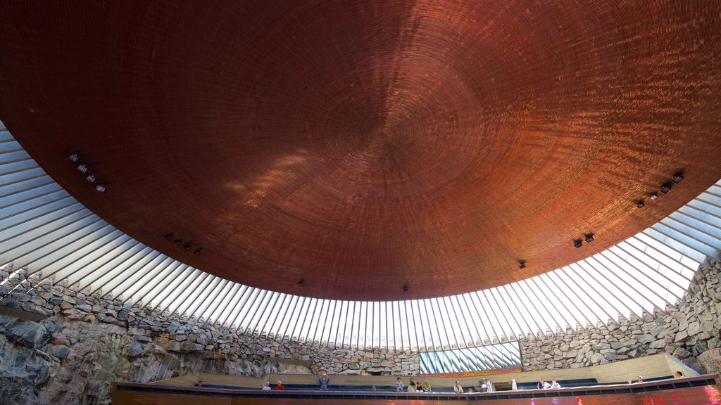 Temppeliaukio Church featuring a church or cathedral and interior views