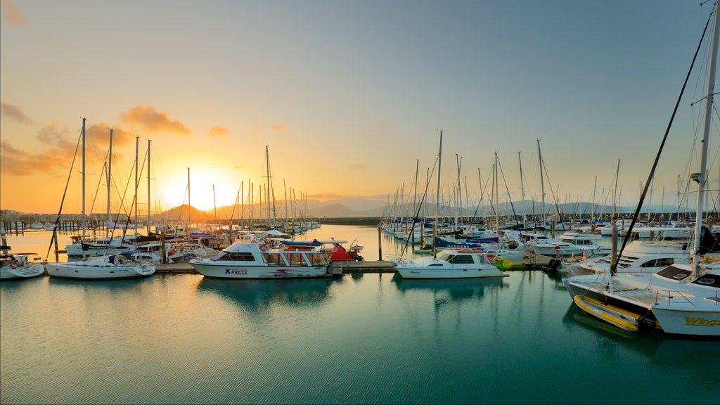 Abel Point Marina showing boating, landscape views and a sunset