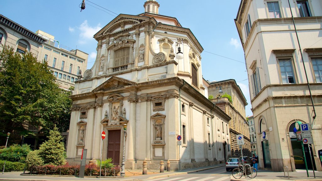 Milan showing heritage architecture, street scenes and a church or cathedral