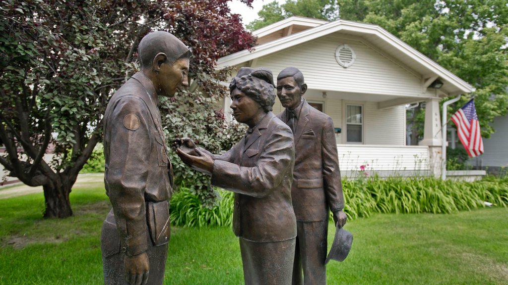 McCook showing a statue or sculpture and a house