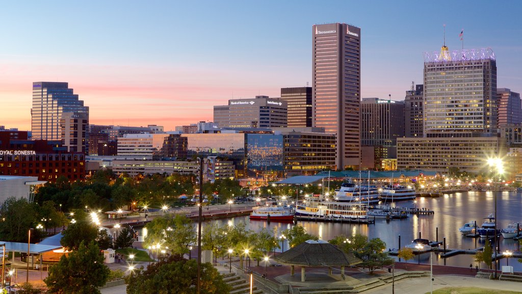 Baltimore showing a city, night scenes and a marina