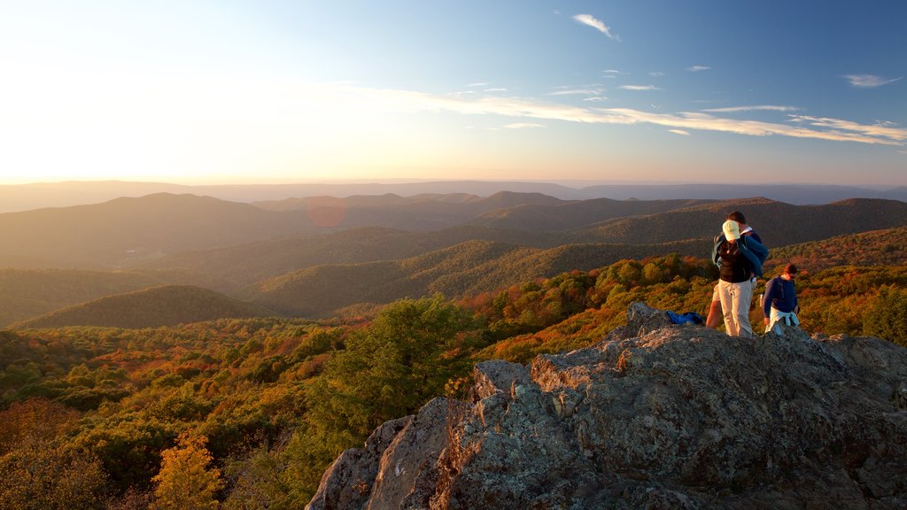 Bearfence Mountain featuring a sunset, landscape views and hiking or walking