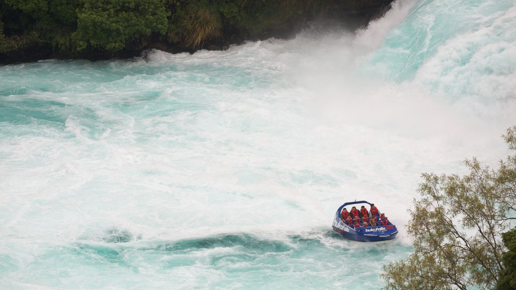 Huka Falls showing rapids, a river or creek and boating