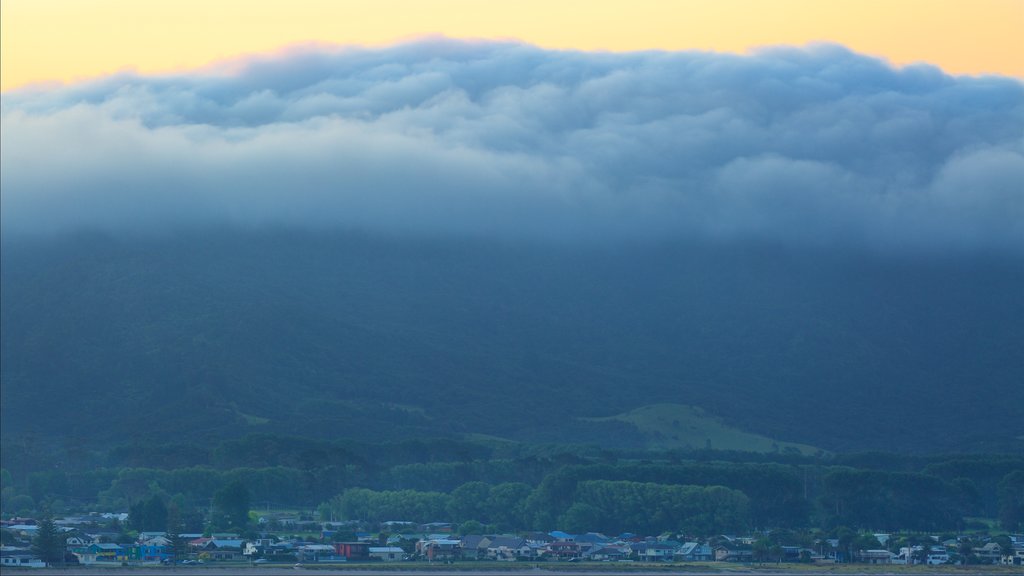 Whitianga showing a coastal town and a sunset