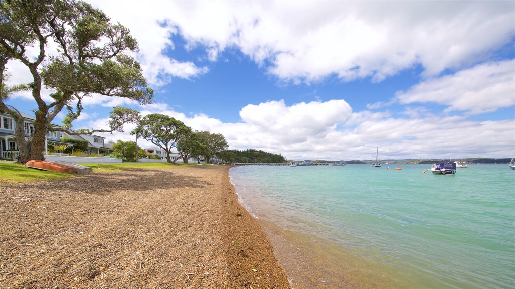 Russell Beach which includes a pebble beach and a bay or harbor