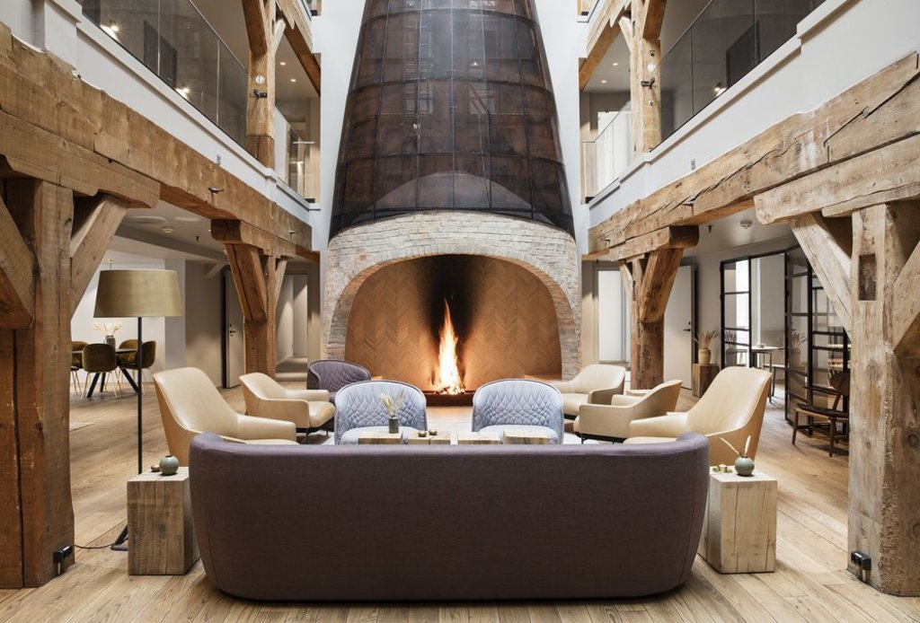 inside decor and fireplace of Hotel Brosundet, âˆšÃ-lesund, Norway