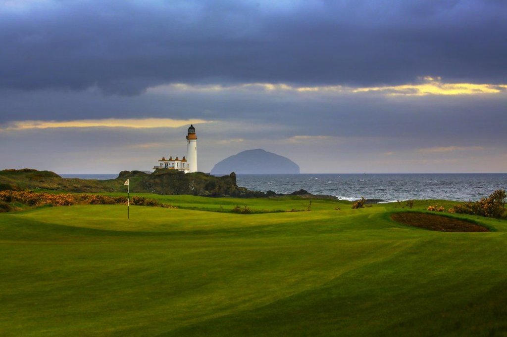view of the lighthouse and golf course at Trump Turnberry hotel, Ayrshire, Scotland on a moody day