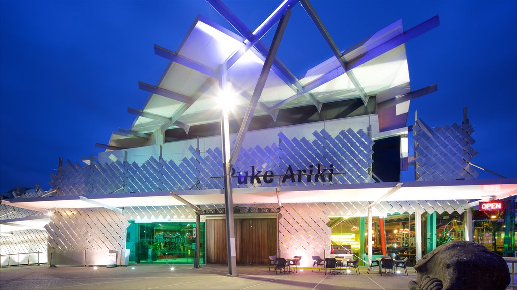 Puke Ariki which includes night scenes and modern architecture