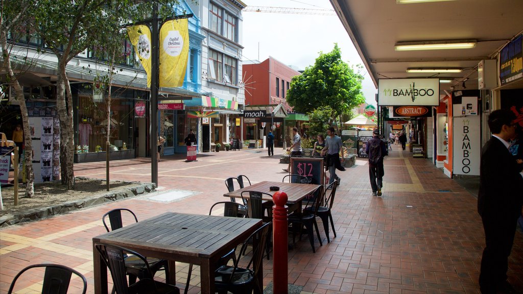 Wellington que incluye imágenes de calles y escenas de café