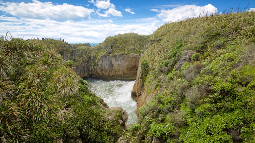 Pancake Rocks which includes tranquil scenes and a river or creek