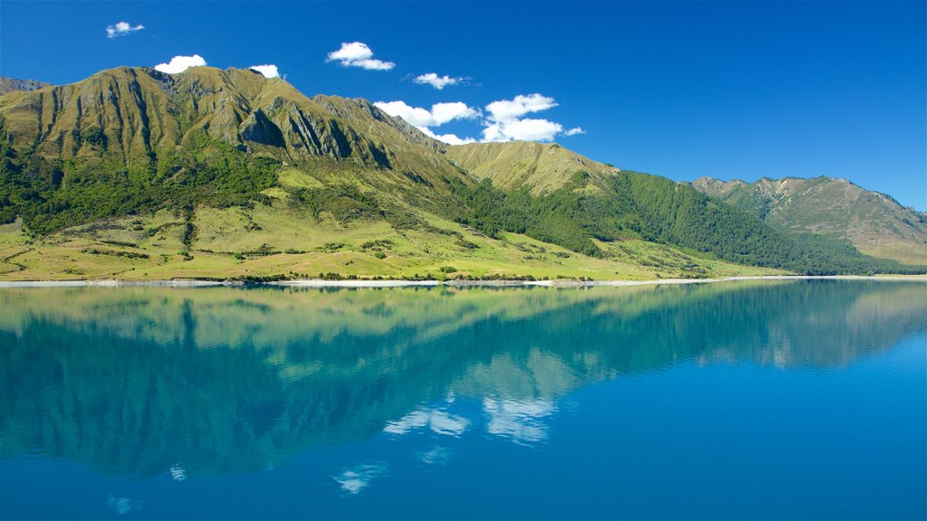 Lake Hawea which includes mountains and a lake or waterhole