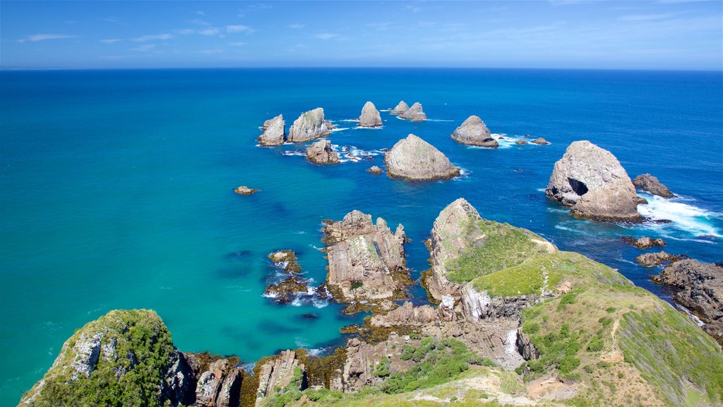 Nugget Point Lighthouse showing rocky coastline