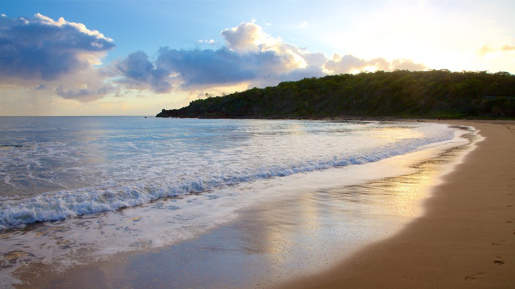 Agnes Water Beach which includes a sunset, a sandy beach and surf