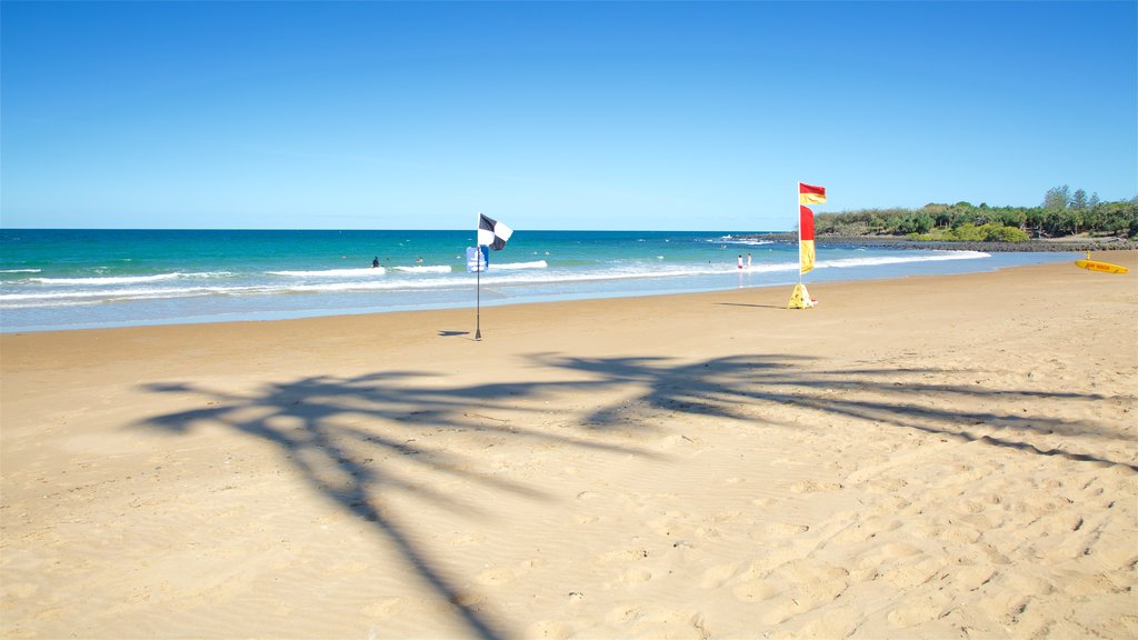 Bargara Beach which includes general coastal views and a sandy beach