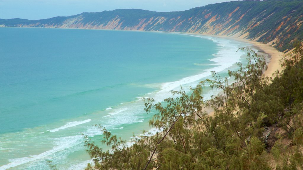 Sunshine Coast showing general coastal views, waves and a beach