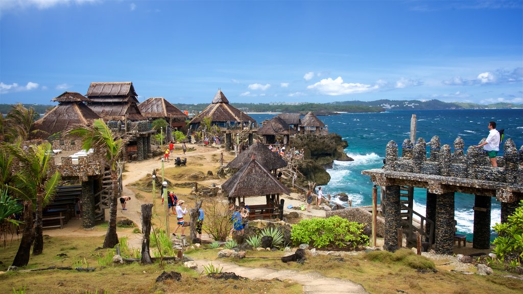 Crystal Cove Island which includes island views, a coastal town and tropical scenes