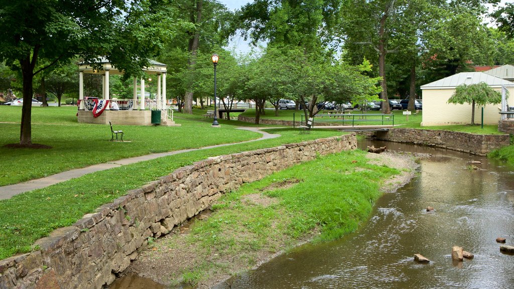 Berkeley Springs State Park featuring a river or creek and a park