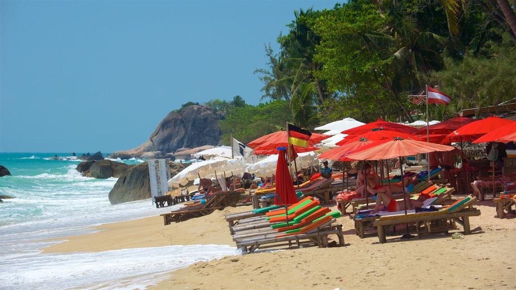 Lamai Beach which includes rocky coastline, a sandy beach and tropical scenes