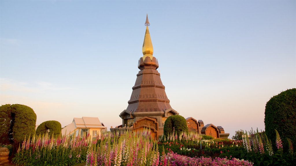 Doi Inthanon National Park which includes a temple or place of worship, a sunset and a park