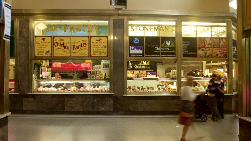 Queen Victoria Market showing interior views and shopping as well as a small group of people