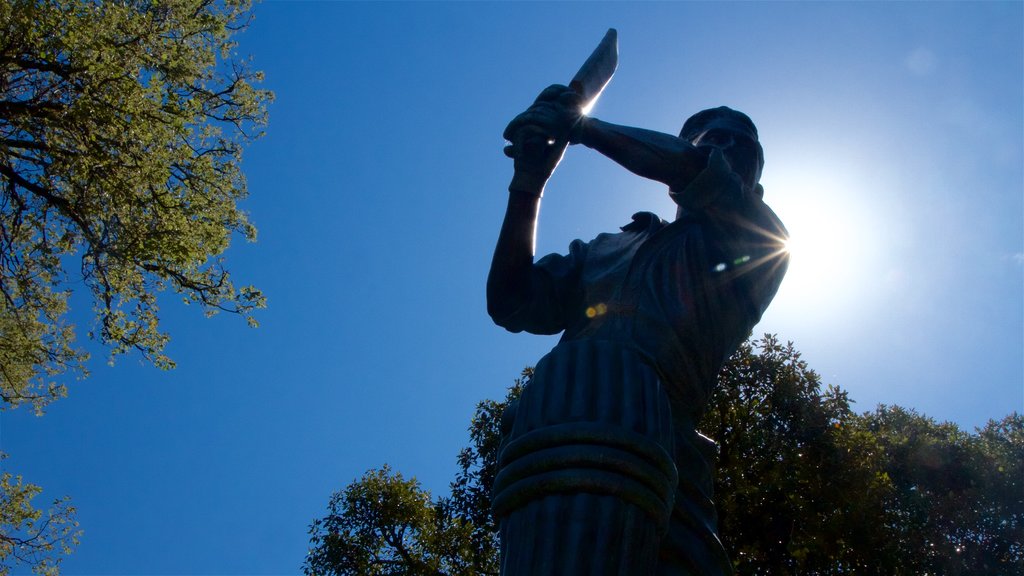 Melbourne Cricket Ground featuring a statue or sculpture