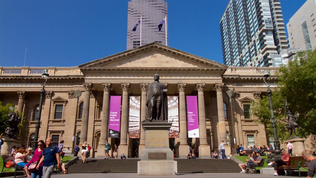 State Library of Victoria showing an administrative building, heritage architecture and a statue or sculpture