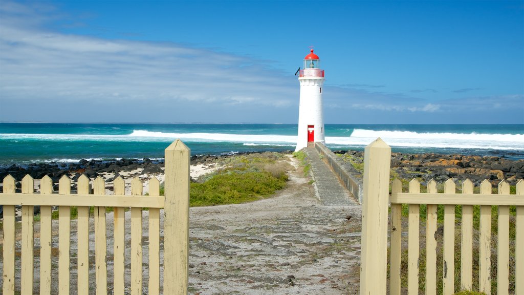 Griffiths Island Lighthouse showing rugged coastline, surf and a lighthouse