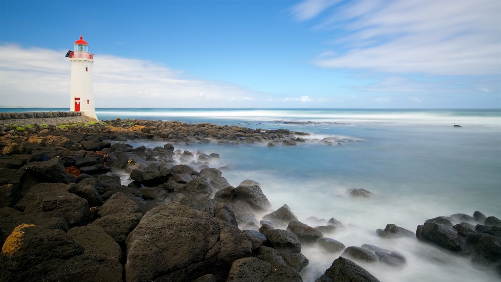 Griffiths Island Lighthouse featuring a lighthouse, rugged coastline and a bay or harbour