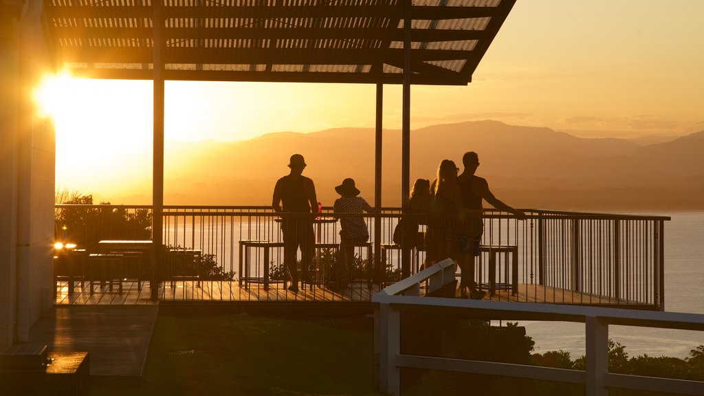 Cape Byron Lighthouse showing views as well as a small group of people