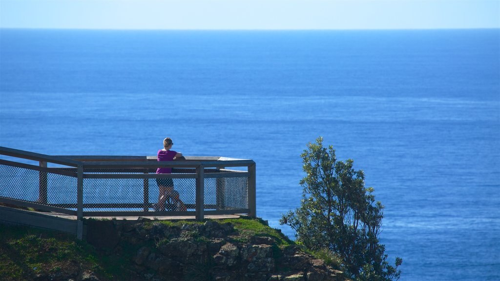 Cape Byron Lighthouse showing views as well as an individual female