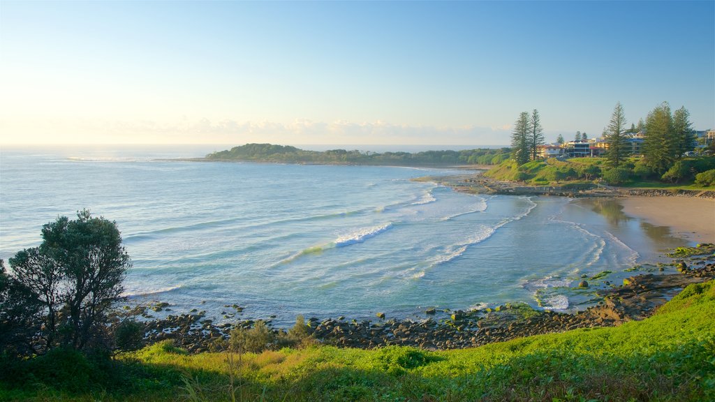 Yamba Beach which includes rocky coastline and a sandy beach