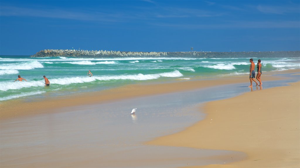 Ballina que inclui uma praia de areia