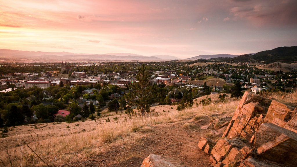 Helena showing a sunset, landscape views and a small town or village