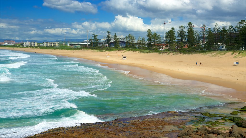 Wollongong South Beach which includes rocky coastline and a sandy beach