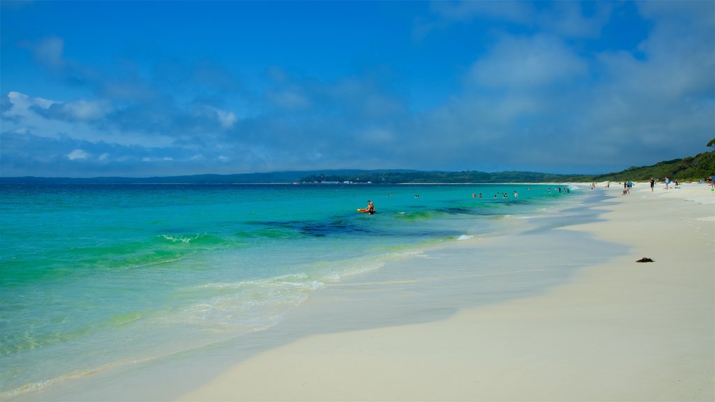 Huskisson which includes a sandy beach and general coastal views