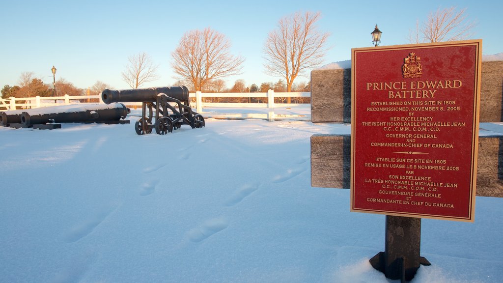 Prince Edward Battery featuring signage and snow