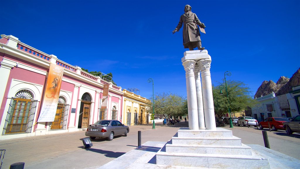 Mexico which includes street scenes and a statue or sculpture