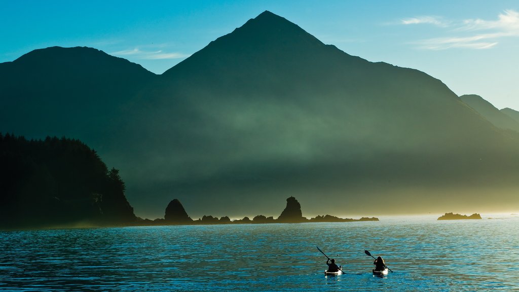 Kodiak Island which includes mist or fog, mountains and kayaking or canoeing