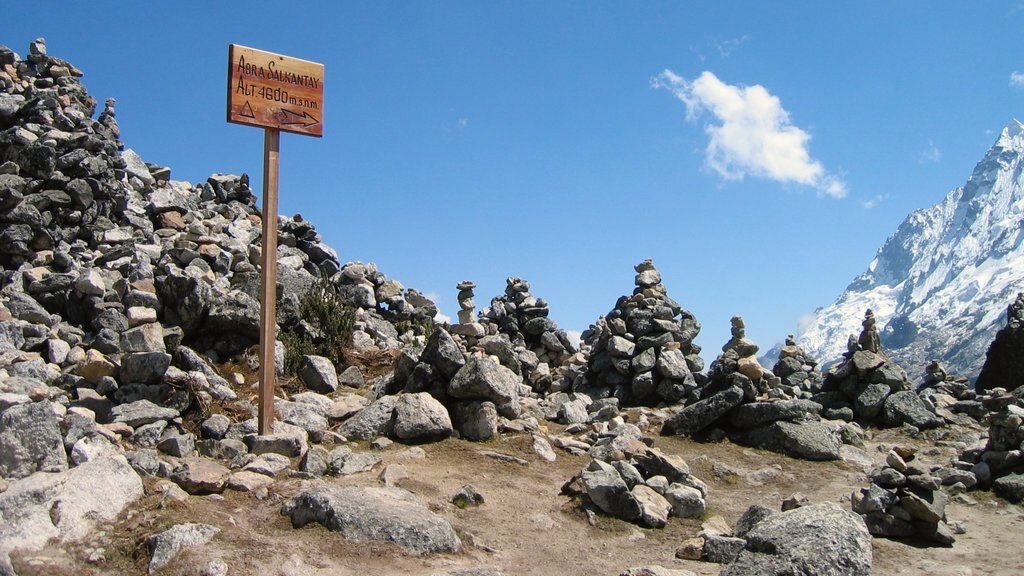 Peruvian Highlands featuring signage and tranquil scenes