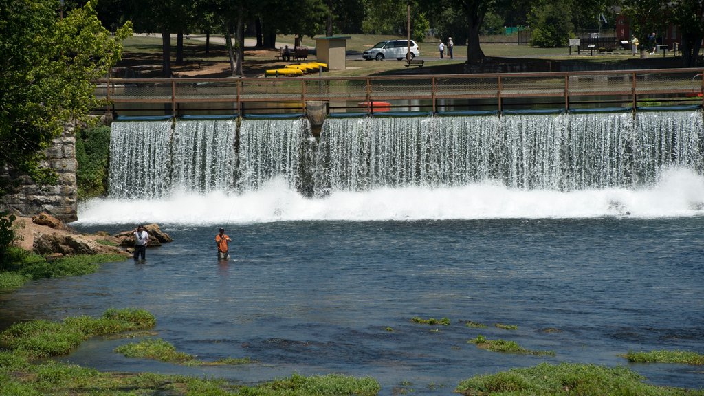 Mammoth Spring which includes a bridge and a river or creek