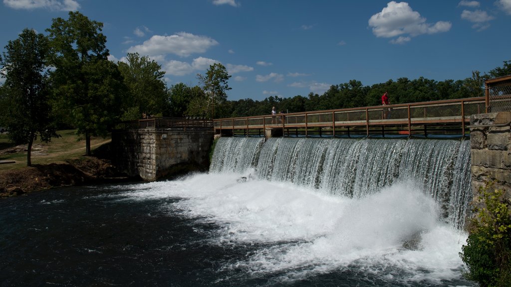 Mammoth Spring showing a bridge and a river or creek