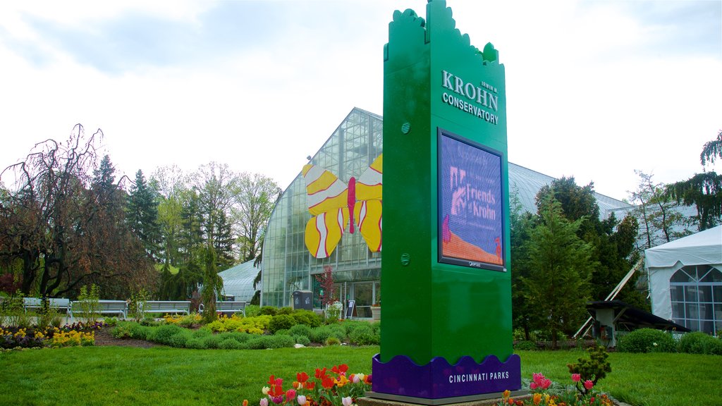 Krohn Conservatory showing signage, a garden and flowers