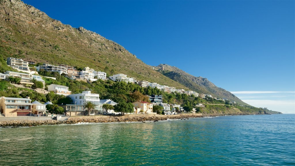 Gordon\'s Bay featuring rugged coastline, a coastal town and tranquil scenes