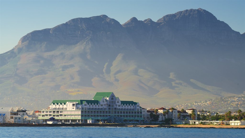 Gordon\'s Bay which includes general coastal views and mountains