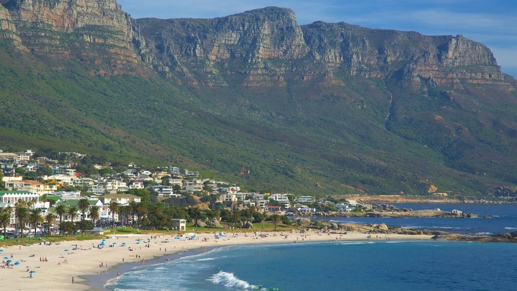 Camps Bay Beach showing a sandy beach and a coastal town