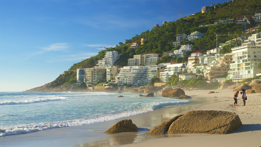 Clifton Bay Beach showing a sandy beach and a coastal town